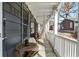 Relaxing covered front porch with string lights and cozy hammock seating at 109 Chester Se Ave, Atlanta, GA 30316