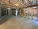 Unfinished basement with exposed beams and concrete floor ready for customization at 1182 Tupelo Chase Ct, Auburn, GA 30011