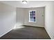 Bedroom with carpet floors and natural light at 1182 Tupelo Chase Ct, Auburn, GA 30011