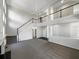 Spacious living room featuring high ceilings, a staircase, and lots of natural light at 1182 Tupelo Chase Ct, Auburn, GA 30011