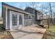 Exterior of home with patio area and a small deck at 1575 Kelleys Close, Stone Mountain, GA 30088