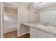 Bathroom featuring vanity with solid surface countertop and tub/shower combo at 1575 Kelleys Close, Stone Mountain, GA 30088
