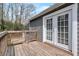 Side view of wooden deck and exterior of house at 1575 Kelleys Close, Stone Mountain, GA 30088