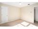 Neutral bedroom with natural light and neutral-colored carpeting at 320 Six Branches Ct, Roswell, GA 30076