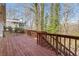 Spacious wooden deck with natural wood railing perfect for outdoor seating and entertaining at 320 Six Branches Ct, Roswell, GA 30076