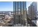 Bright city view featuring the Trust building amidst Atlanta's skyline and a hint of surrounding greenery at 300 Peachtree Ne St # 24F, Atlanta, GA 30308