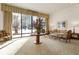 Comfortable lobby boasts cozy seating, large windows, and sophisticated decor with a view of the outside at 300 Peachtree Ne St # 24F, Atlanta, GA 30308