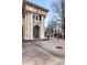 The Advancement of Carnegie is shown in a stone archway with sidewalks on a beautiful and sunny day at 300 Peachtree Ne St # 24F, Atlanta, GA 30308