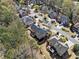 Bird's eye view of brick house with deck, landscaped yard, and surrounding community at 4312 White Hickory Nw Ln, Kennesaw, GA 30152
