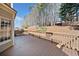 Spacious wooden deck adjoins house and overlooks sloping, landscaped backyard at 4312 White Hickory Nw Ln, Kennesaw, GA 30152
