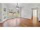 Bright dining area with hardwood floors, bay windows, and access to the outdoor space at 4312 White Hickory Nw Ln, Kennesaw, GA 30152