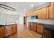 Bright and airy kitchen features an island, hardwood floors, and ample cabinet space at 4312 White Hickory Nw Ln, Kennesaw, GA 30152