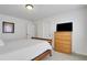 Bedroom featuring natural light, closet and television at 1803 Stone Bridge Way, Marietta, GA 30064
