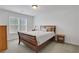 Comfortable bedroom with bedside tables and natural light at 1803 Stone Bridge Way, Marietta, GA 30064