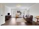 Spacious living room boasts hardwood floors, lots of light, and neutral walls at 1803 Stone Bridge Way, Marietta, GA 30064
