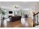 Bright living room with fireplace, dark wood floors, and plenty of natural light at 1803 Stone Bridge Way, Marietta, GA 30064