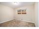 This bedroom boasts carpeted flooring and neutral walls and natural light at 2131 Columbia Dr, Decatur, GA 30032