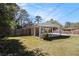 Home exterior with carport and fenced yard with healthy green grass at 2131 Columbia Dr, Decatur, GA 30032