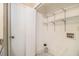 Laundry room with wood-look floors, wire racks, and white walls at 2131 Columbia Dr, Decatur, GA 30032