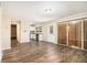 Open-concept layout with hardwood floors connecting the kitchen and living room at 2131 Columbia Dr, Decatur, GA 30032