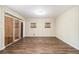 Spacious living room featuring hardwood floors and neutral walls at 2131 Columbia Dr, Decatur, GA 30032