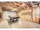 Unfinished basement area with ping pong table and exposed ceiling at 2290 Dragonfly Nw Ct, Acworth, GA 30101
