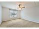 Bedroom featuring carpet, a ceiling fan, and a window at 2290 Dragonfly Nw Ct, Acworth, GA 30101
