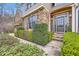 Inviting entryway with stone accents, lush landscaping, and a 'WELCOME' sign creating a warm and friendly ambiance at 2290 Dragonfly Nw Ct, Acworth, GA 30101