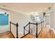 Hallway with hardwood floors and stairway at 2290 Dragonfly Nw Ct, Acworth, GA 30101