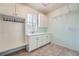 Mud room featuring built-in storage, a utility sink, and tile flooring at 2290 Dragonfly Nw Ct, Acworth, GA 30101