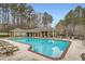 Community pool with ample lounge seating and a covered pavilion area for relaxation at 2290 Dragonfly Nw Ct, Acworth, GA 30101