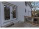 Home exterior features a large, secure patio area and stairs leading to the yard, perfect for outdoor enjoyment at 2430 Hanford Sw Dr, Atlanta, GA 30315