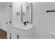 Clean bathroom featuring a modern sink, vanity, and minimalist design at 2430 Hanford Sw Dr, Atlanta, GA 30315