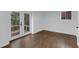 Bright bedroom with hardwood floors and double doors leading to a deck at 2430 Hanford Sw Dr, Atlanta, GA 30315