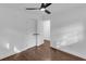 Spacious bedroom featuring modern ceiling fan, hardwood flooring, and closet with an open door at 2430 Hanford Sw Dr, Atlanta, GA 30315