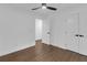 Bedroom features hardwood flooring, white walls, and a ceiling fan at 2430 Hanford Sw Dr, Atlanta, GA 30315