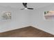 A spacious bedroom has hardwood floors, natural light, and a ceiling fan at 2430 Hanford Sw Dr, Atlanta, GA 30315
