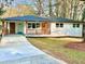 Charming single-story home featuring a welcoming front porch and freshly painted exterior at 2430 Hanford Sw Dr, Atlanta, GA 30315