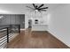 Stylish living area with hardwood floors, a kitchen island and modern appliances at 2430 Hanford Sw Dr, Atlanta, GA 30315