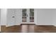 Room with hardwood flooring and French doors leading to the backyard at 2430 Hanford Sw Dr, Atlanta, GA 30315