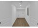 Spacious walk-in closet with ample storage space and built-in shelving at 2430 Hanford Sw Dr, Atlanta, GA 30315