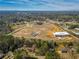 Aerial view of construction site with surrounding community features at 210 Barrett Springs Way, Canton, GA 30115