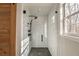 Modern bathroom shower with black hardware and stylish subway tile at 210 Barrett Springs Way, Canton, GA 30115