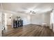 Bright bonus room with a modern bookcase and wood floors at 210 Barrett Springs Way, Canton, GA 30115