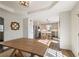 Dining room showing open-concept access to the kitchen at 210 Barrett Springs Way, Canton, GA 30115