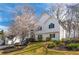 Charming two-story home with landscaped garden, perfect for outdoor enjoyment and curb appeal at 210 Barrett Springs Way, Canton, GA 30115