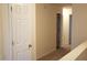 Bright hallway with access to multiple rooms and neutral decor at 2102 Executive Dr, Duluth, GA 30096