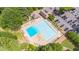 Aerial view of the community pool and parking at 7085 Wakehurst Pl, Cumming, GA 30040