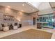 Inviting community lobby features elegant decor, comfortable seating, and a wine display at 7085 Wakehurst Pl, Cumming, GA 30040