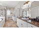 Bathroom showcasing travertine floors, granite counters, double sinks, and glass shower at 129 Euharlee 5 Forks Rd, Euharlee, GA 30145